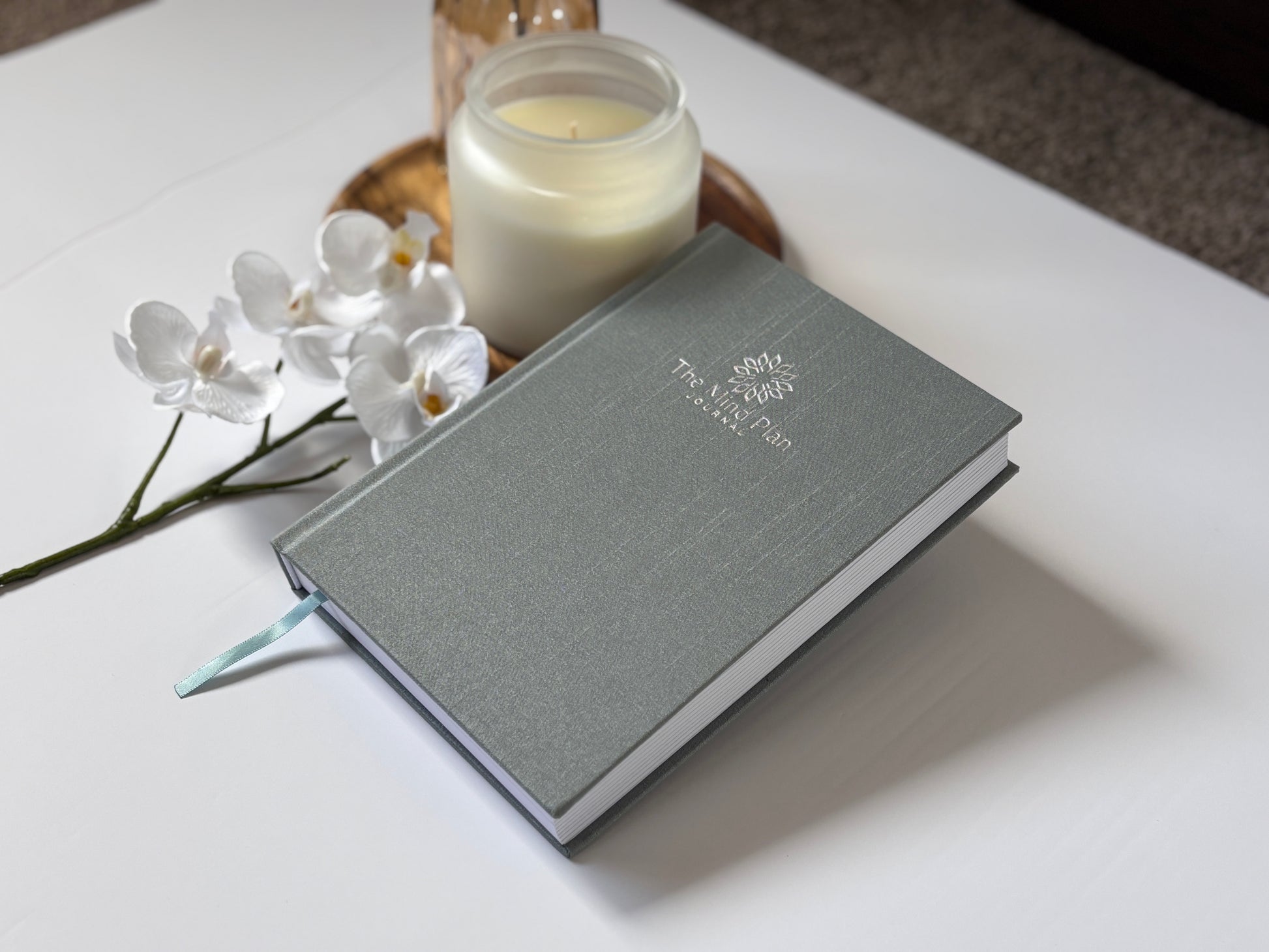 Cover of journal with candles and flower